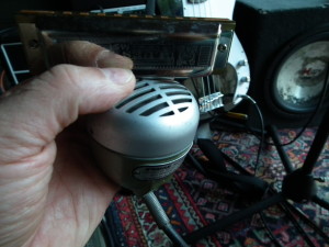 The bullet mic is traditionally used on harmonica.